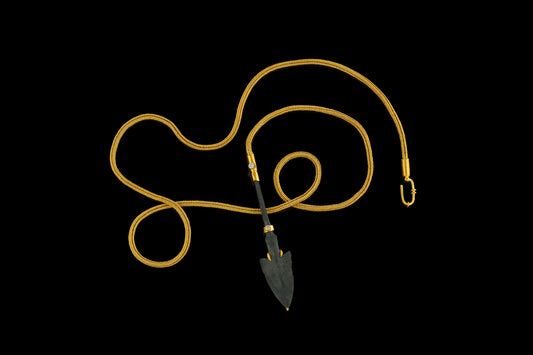 Persian bronze arrowhead (c. 1200-1800 BCE) in a modern gold frame accented with diamonds on a handwoven gold chain.
