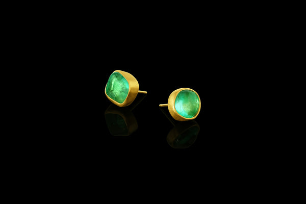 Tumbled emerald drop earrings. Post back.  Side view.