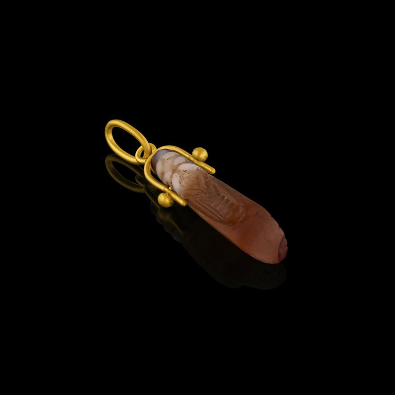 Ancient Greek Agate Grasshopper (c. 300-200 BCE) suspended from a modern gold bail. Underside.