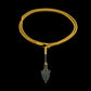 Persian bronze arrowhead (c. 1200-1800 BCE) in a modern gold frame accented with diamonds on a handwoven gold chain.