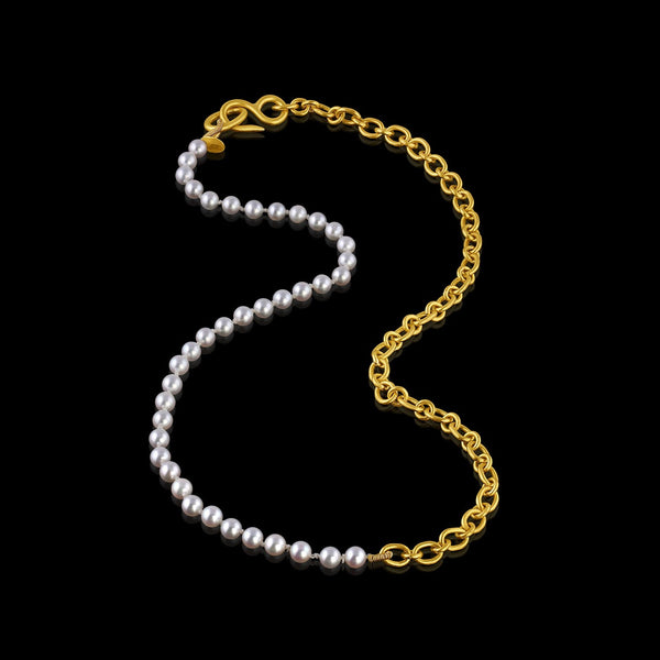 Elegant and playful, this combination necklace is half Akoya pearls and half handmade chain in 22k yellow gold. Closes with our signature shepherd's hook clasp. Pearls are individually hand tied on silk.