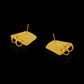 Earrings based on the shape of ancient tablets, featuring a textured surface and suspending two hoops. Back. 