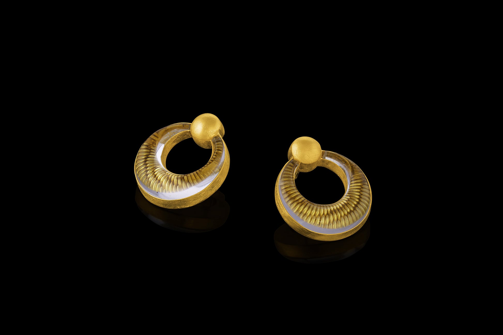 Rock crystal over yellow gold granulation earrings inspired by Ancient Egyptian paintings.