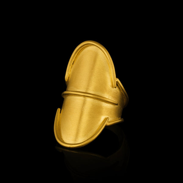 A shield-shaped 22k gold ring. 